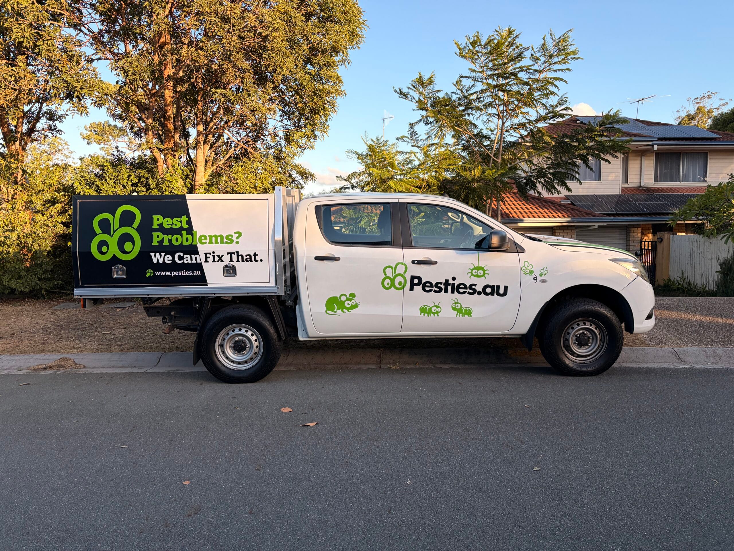 Pesties.au pest control vehicle parked at a Gold Coast home for a termite inspection